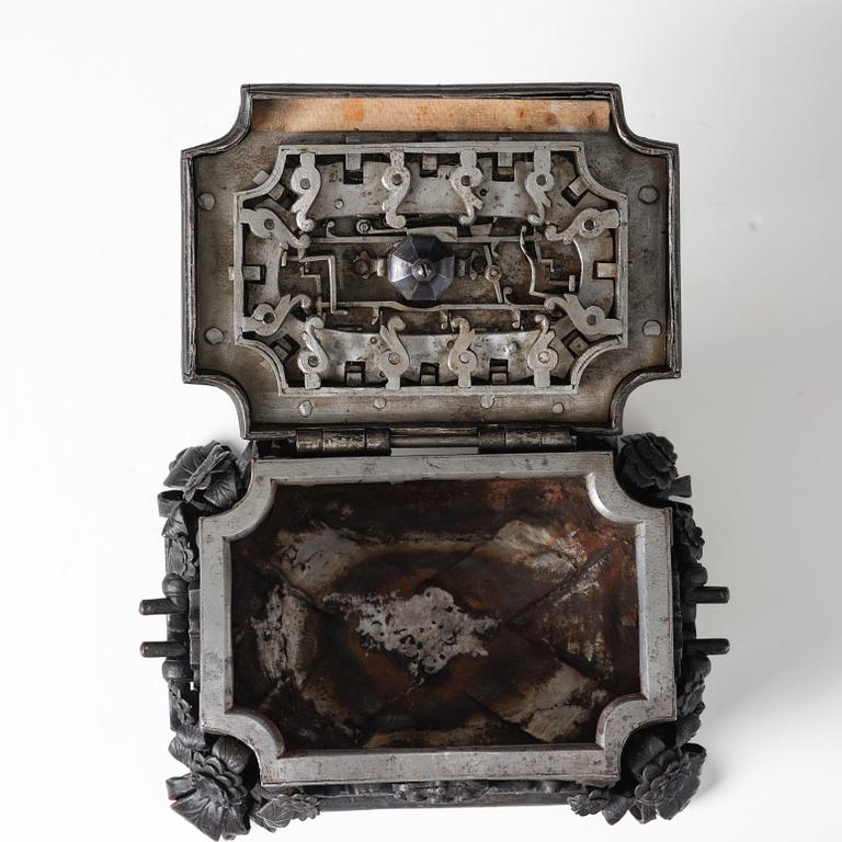 A South-German, presumably Nuremberg, Baroque iron and steel strongbox, later part of the 17th century.