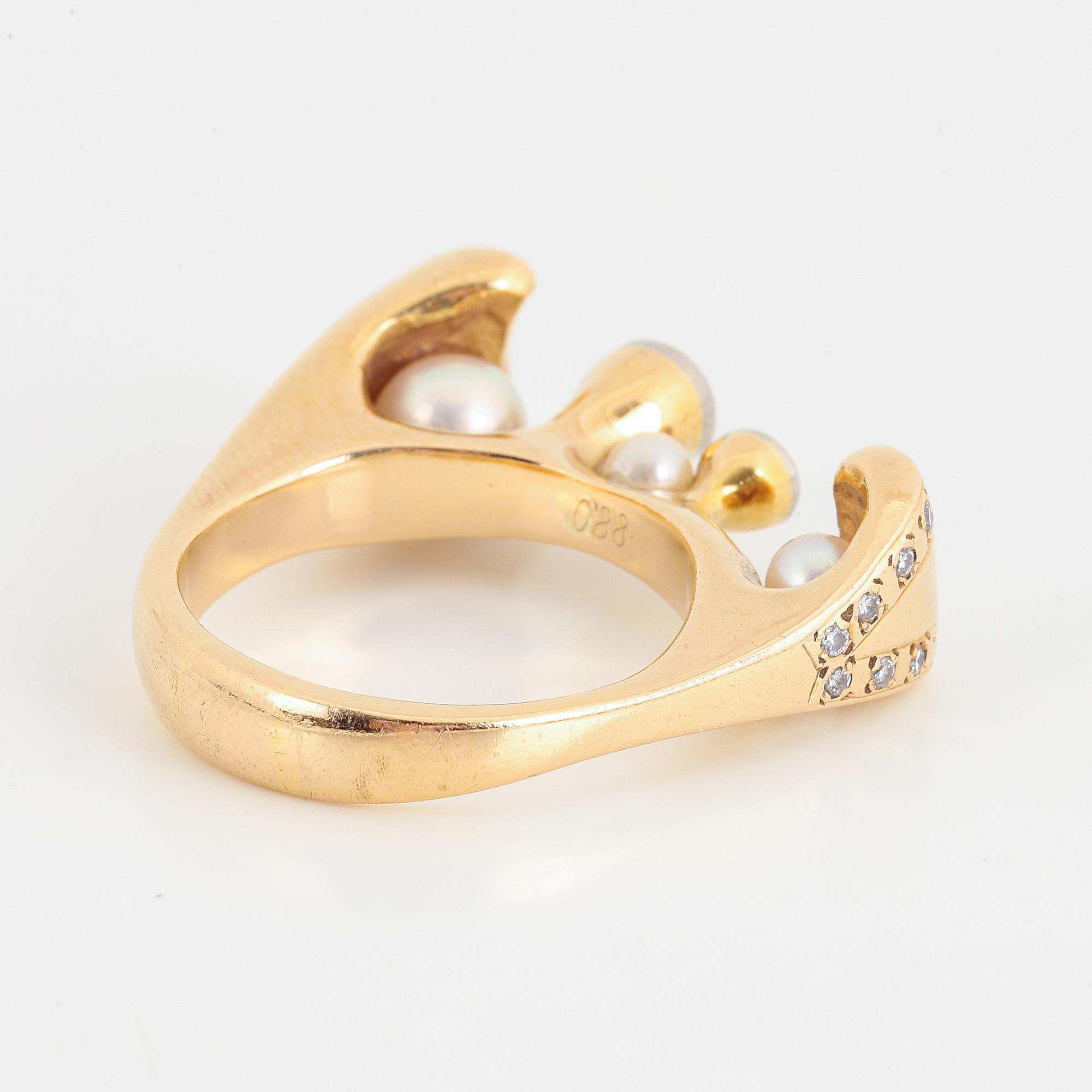 Brilliant-cut diamond and pearl ring.