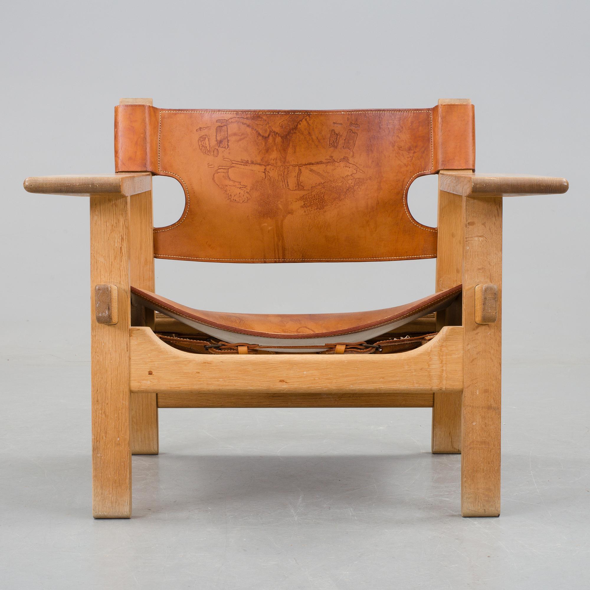 A Børge Mogensen oak and leather 'Spanish Chair' by Fredericia Stolefabrik, Denmark.