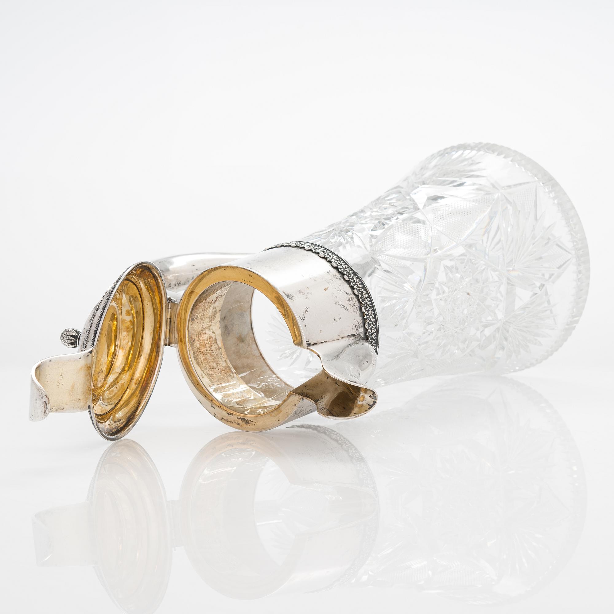 A glass carafe and box with silver mountings from the early 20th-century. Box marked in Saint Petersburg 1908-26.