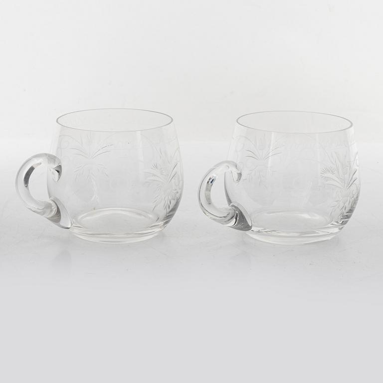 A punch bowl and mugs, glass, mid 20th century.