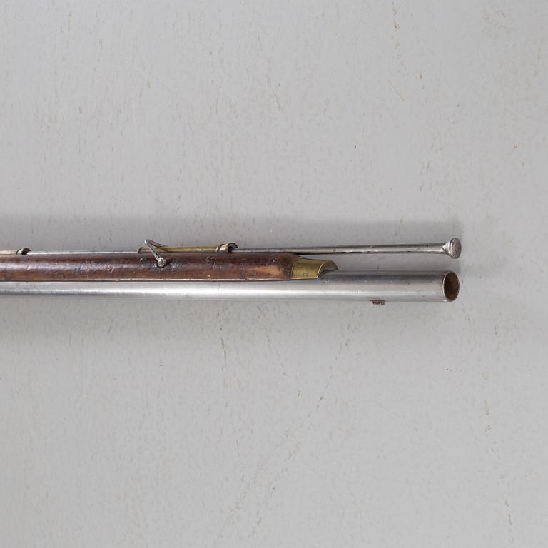 A flintlock rifle from Tower, England, around the year 1800.