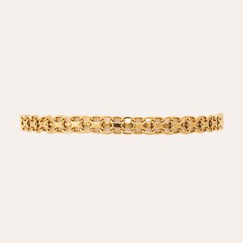 An 18K gold x-link bracelet.