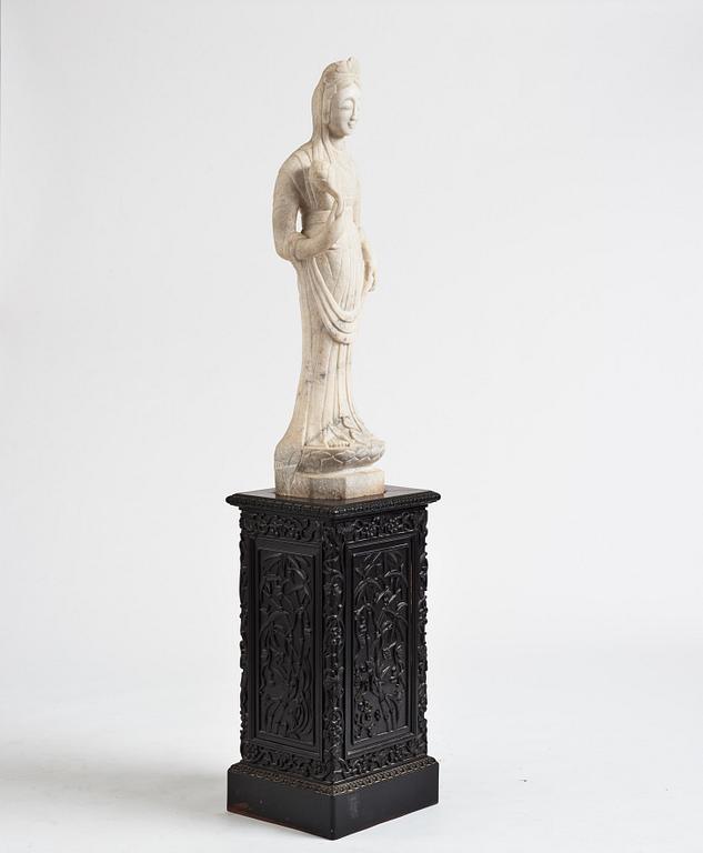 A white stone scultpure of Guanyin, China, presumably early 20th Century.