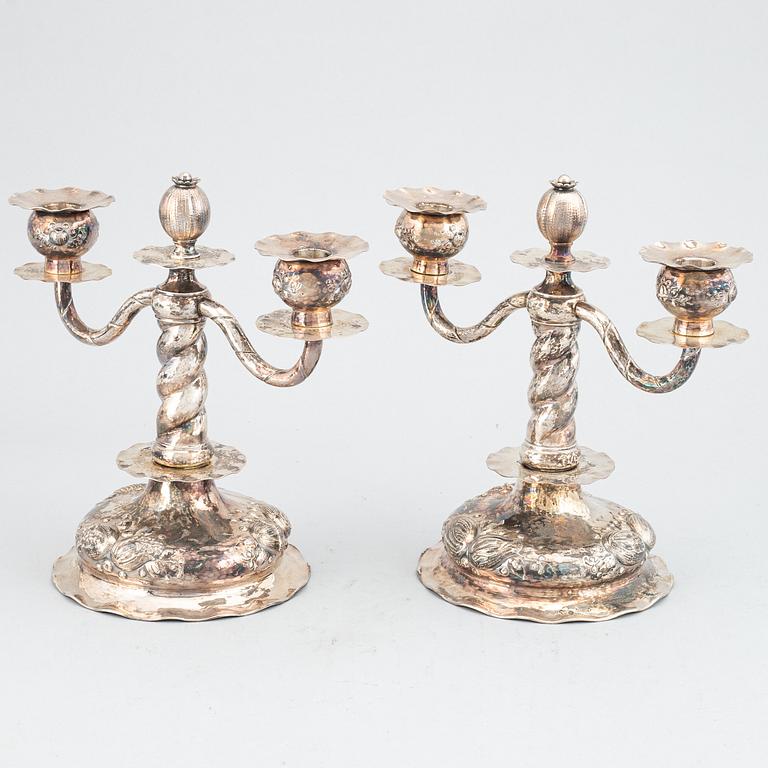 A pair of silver candelabra, CG Hallberg, Stockholm 1955.