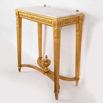 A Gustavian Style Mirror with Table, circa 1900.