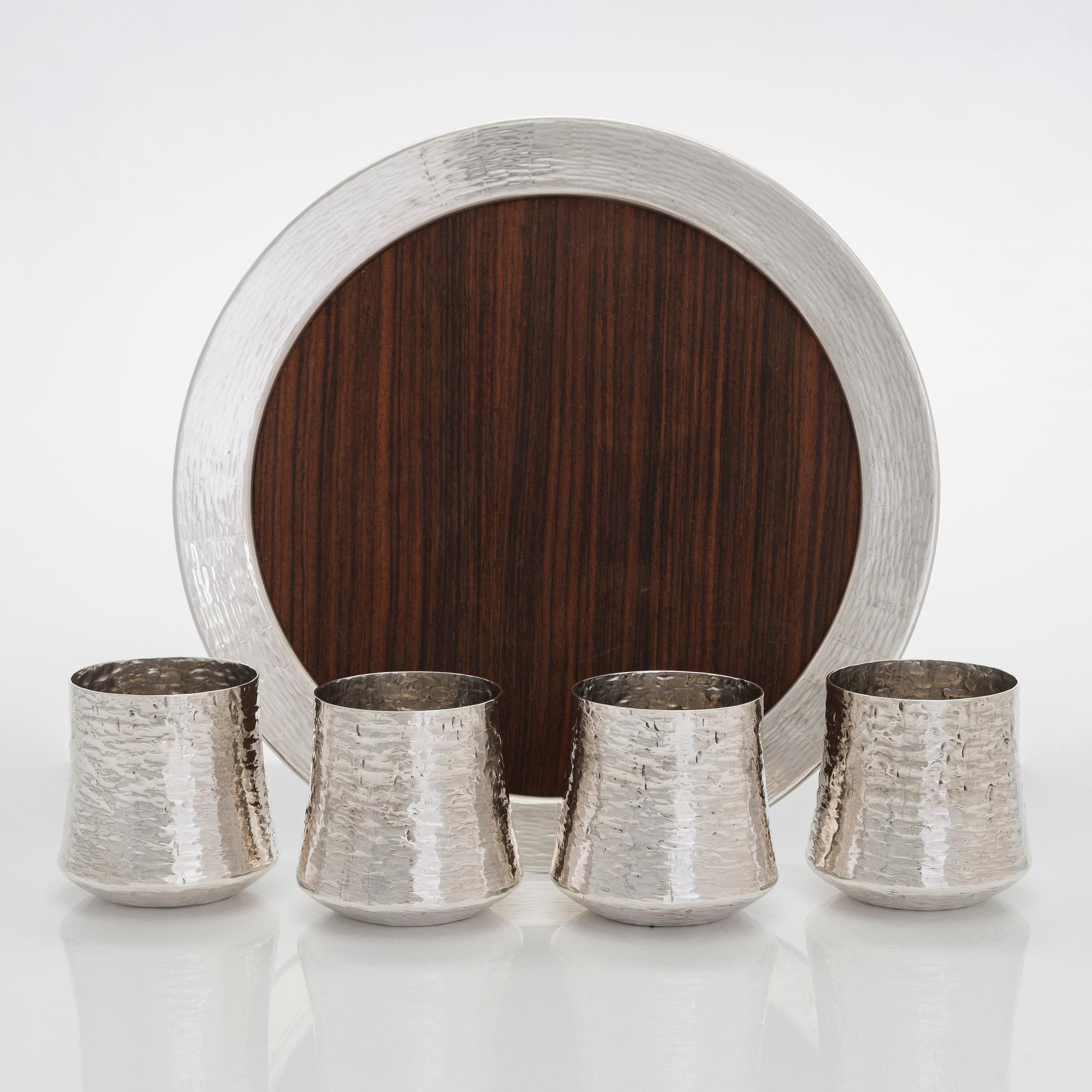 Tapio Wirkkala, four silver beakers, and a rosewood and sterling silver tray, Kultakeskus, Hämeenlinna 1973-74.
