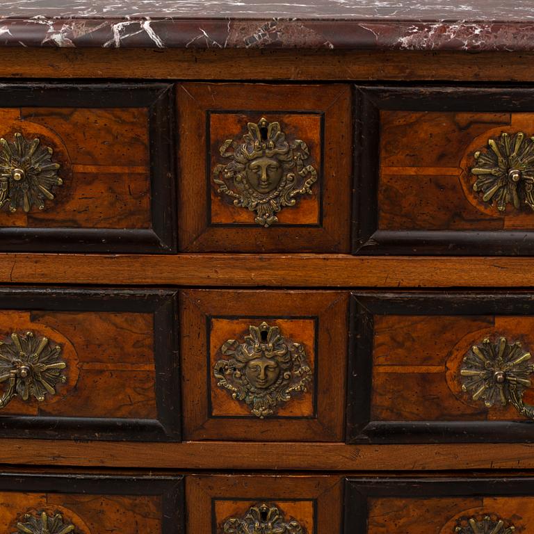 A 20th century French Regence style commode.