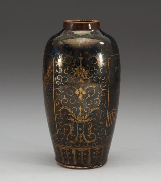 A gilt black vase, Qing dynasty, 18th Century, with Kangxis six character mark.