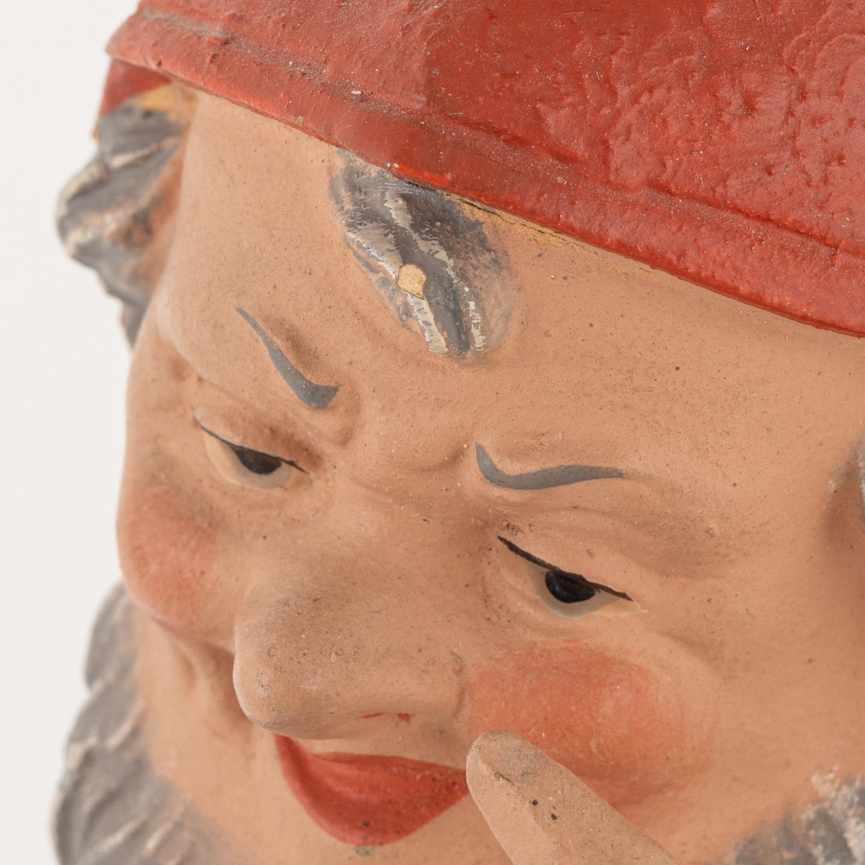 A pair of garden gnomes, mid-20th century.