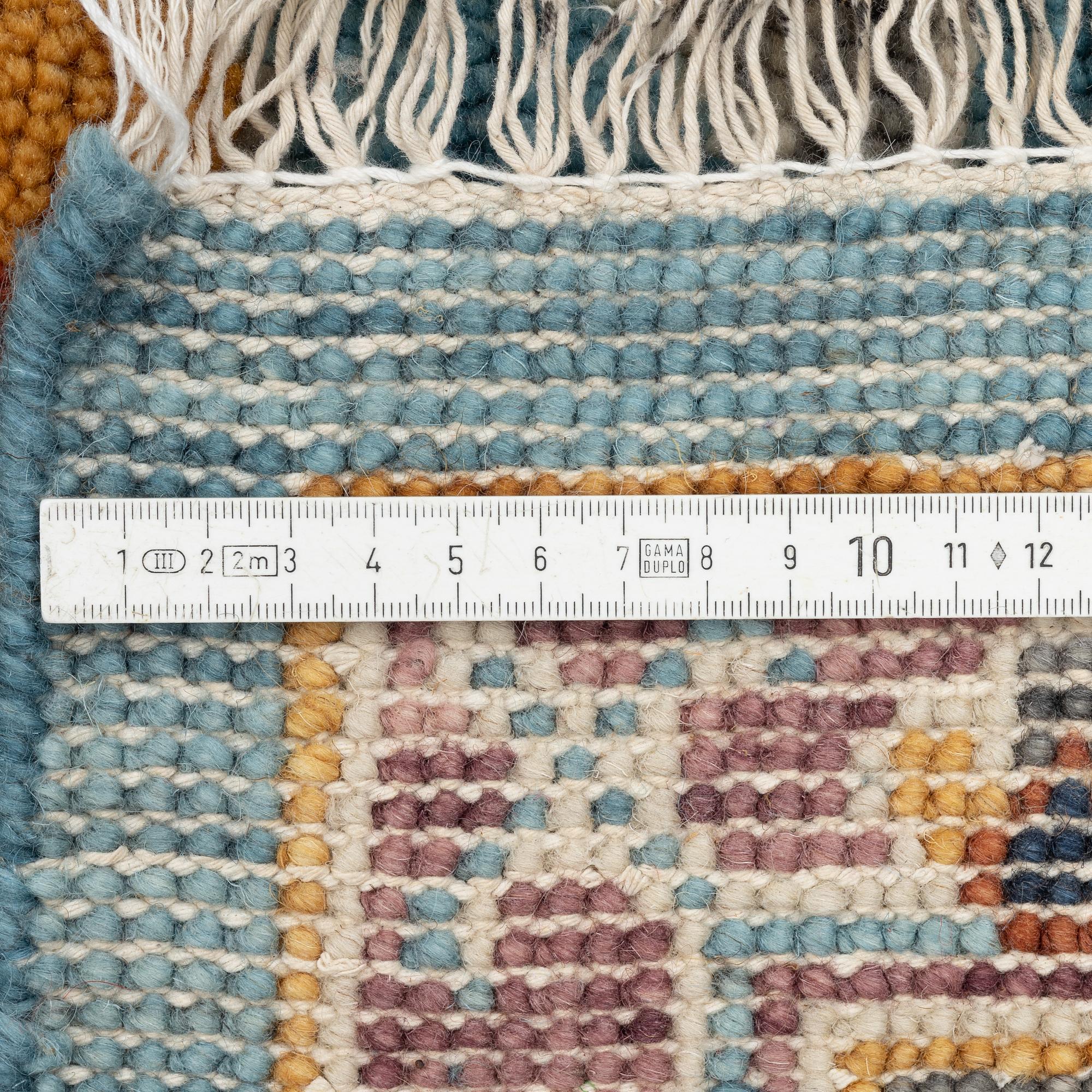 A Heriz design carpet, c. 301 x 240 cm.