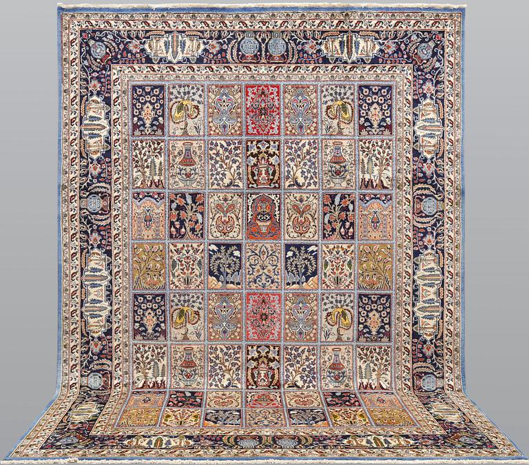 A Figural Sarouk carpet, c. 348 x 240 cm.