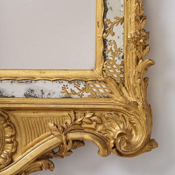 A giltwood rococo mirror, Stockholm, later part 18th century.