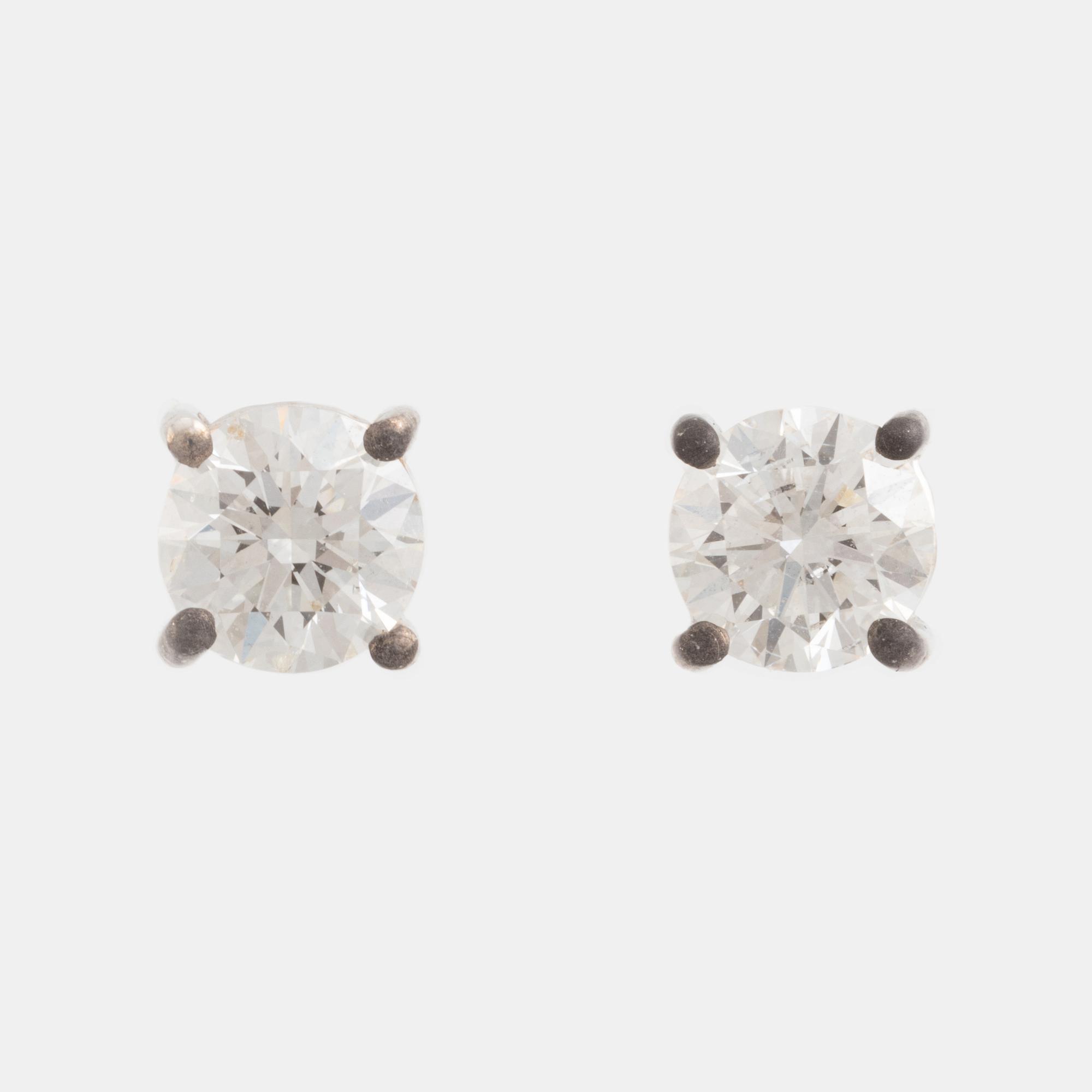 Brilliant cut diamond stud earrings, with IGI report.
