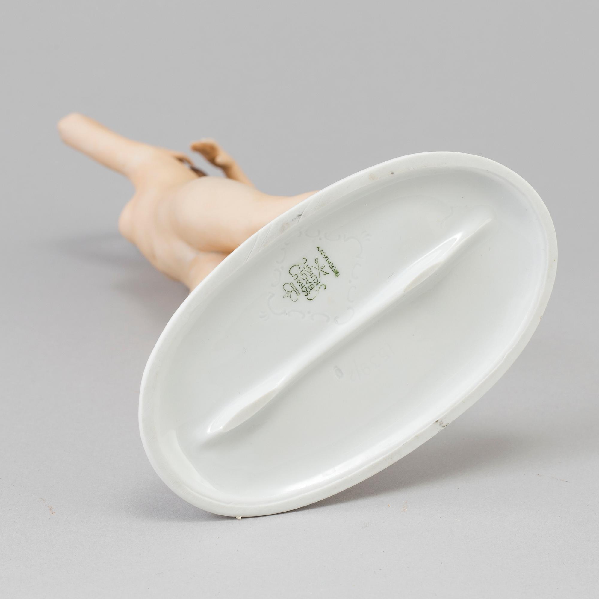 A porcelain figurine by Schaubach Kunst, Germany, first half of the 20th century.