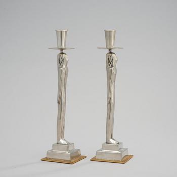A pair of Edvin Öhrström 'Egyptian' pewter candlesticks, Svenskt Tenn, Stockholm 2001.