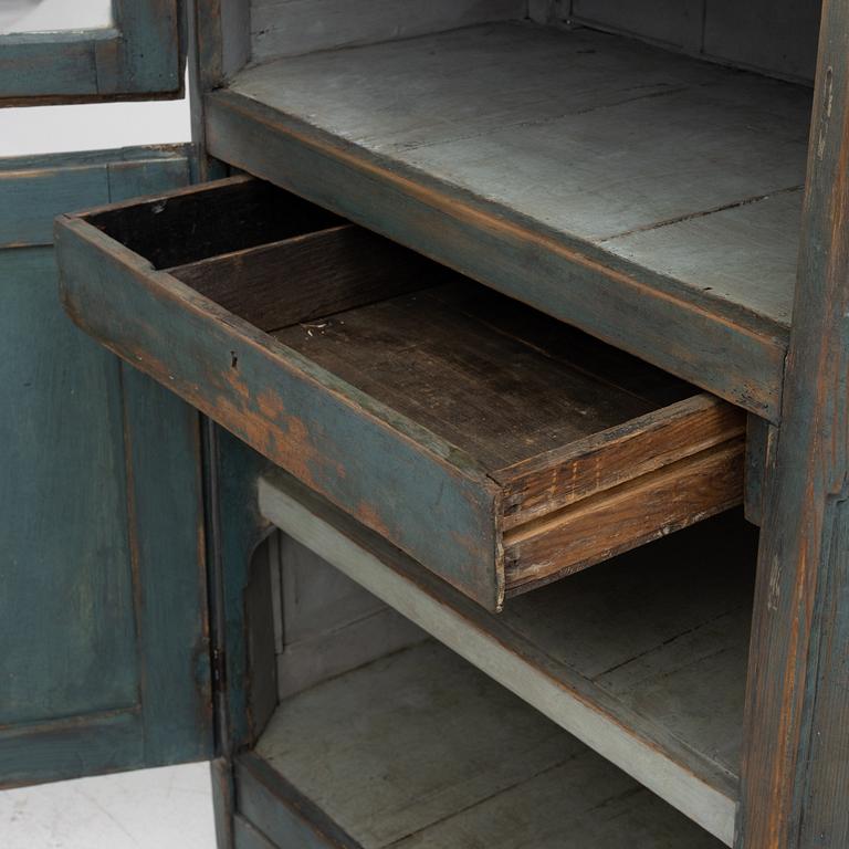 A 19th century vitrine cabinet.