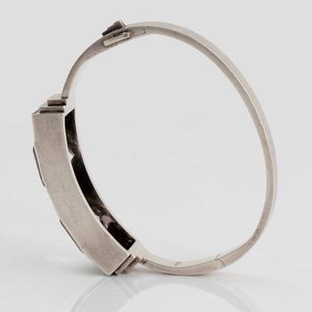 Wiwen Nilsson, a sterling silver bangle with facet cut rock crystal and onyx, Lund, Sweden 1940.