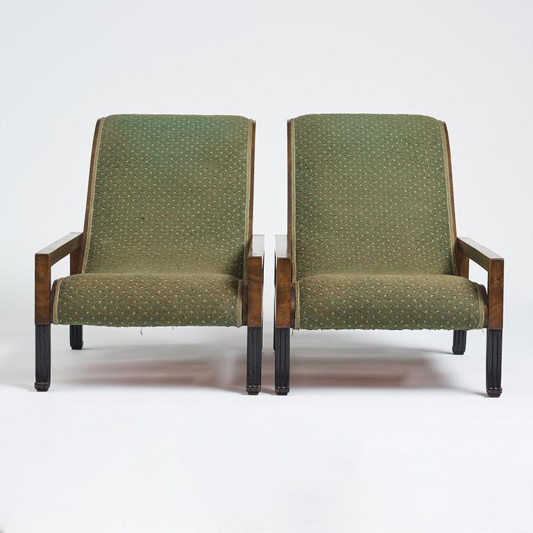 Carl Hörvik, a pair of mahogany-stained birch lounge chairs, Swedish Grace 1920s.