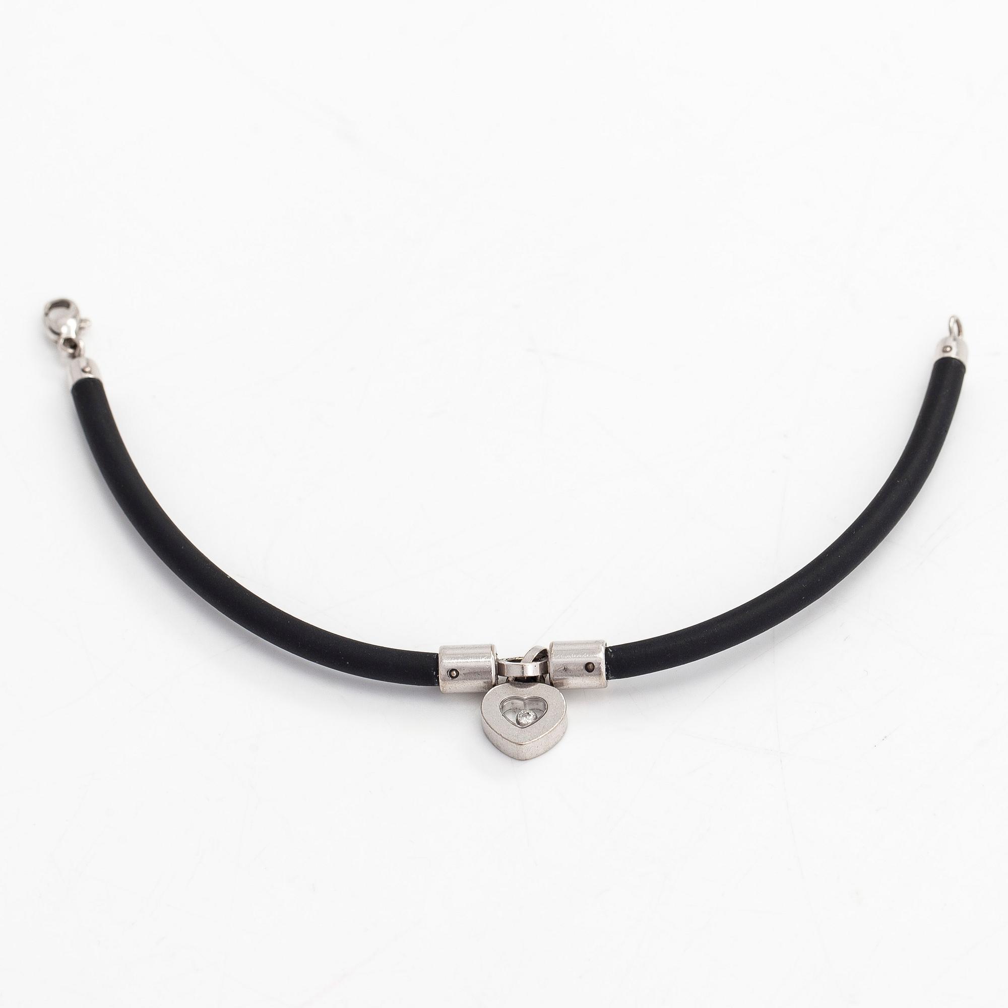 Chopard, armband, "Happy Diamonds", 18K vitguld, gummi och en diamant 0.05 ct.