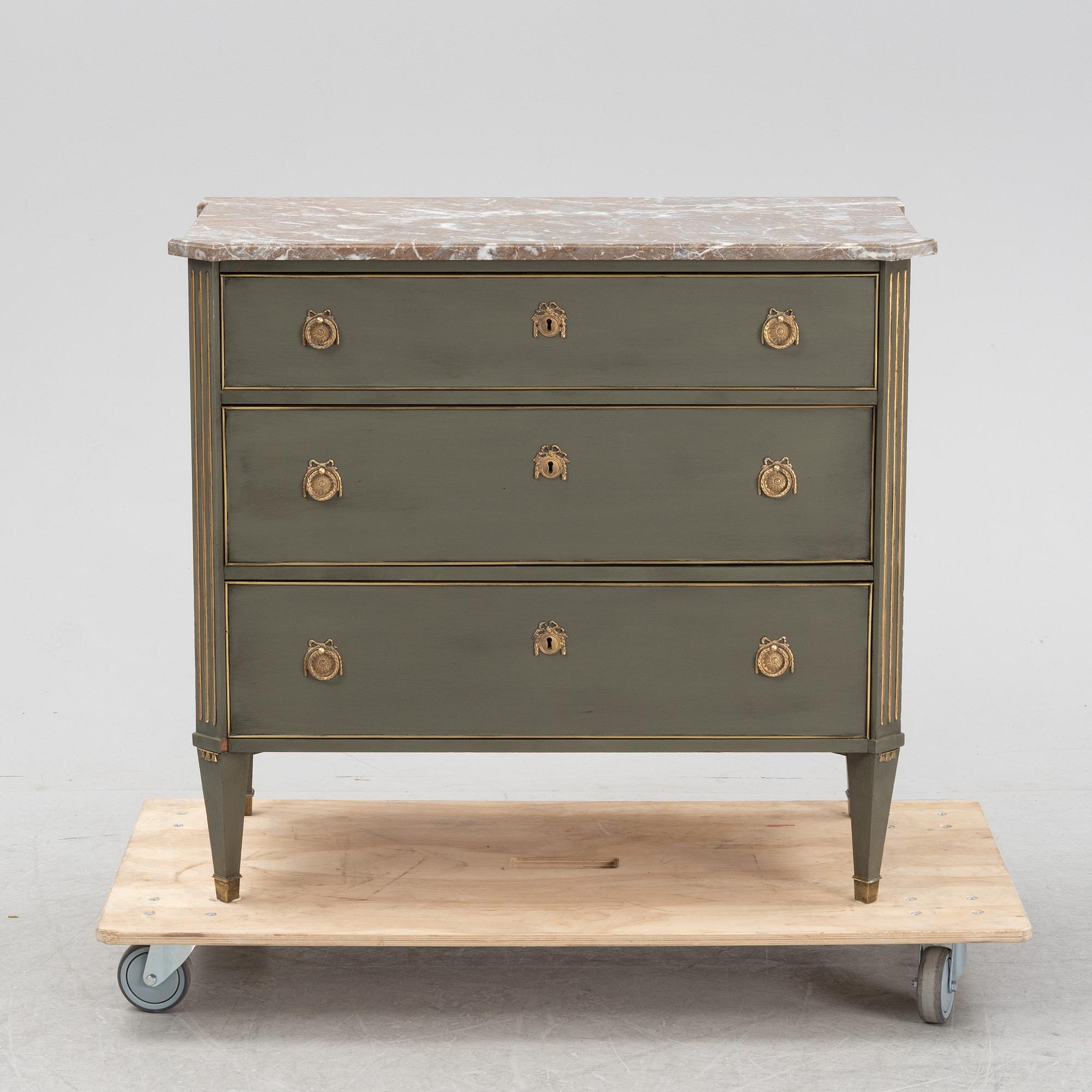 A late gustavian style chest of drawers, first half of the 20th Century.