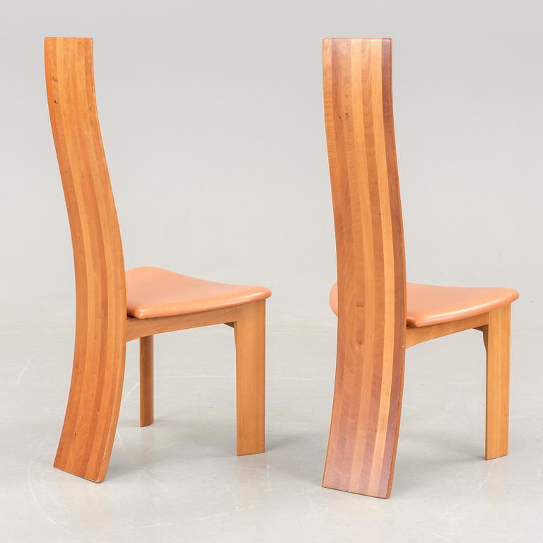 A Bob van den Berghe "Cirkante" table and 6 "Iris" chairs, Van den Berghe-Pauvers, Gent, 21h Century.