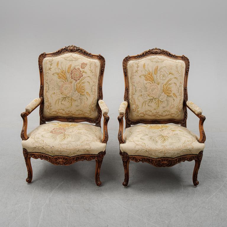 A pair of Louis XV style armchairs from early 20th Century.
