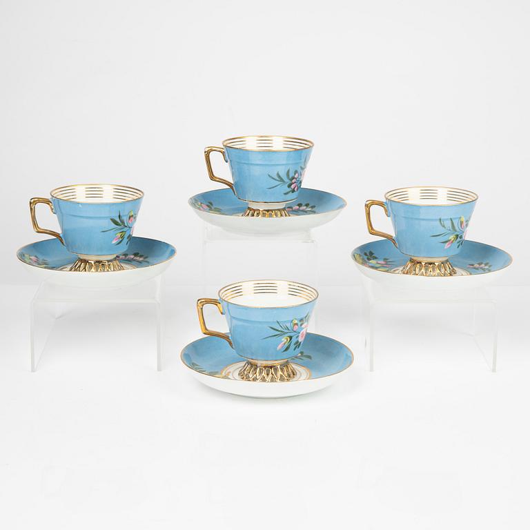 Kuznetsov, four porcelain cups and saucers, Russia, circa 1900.