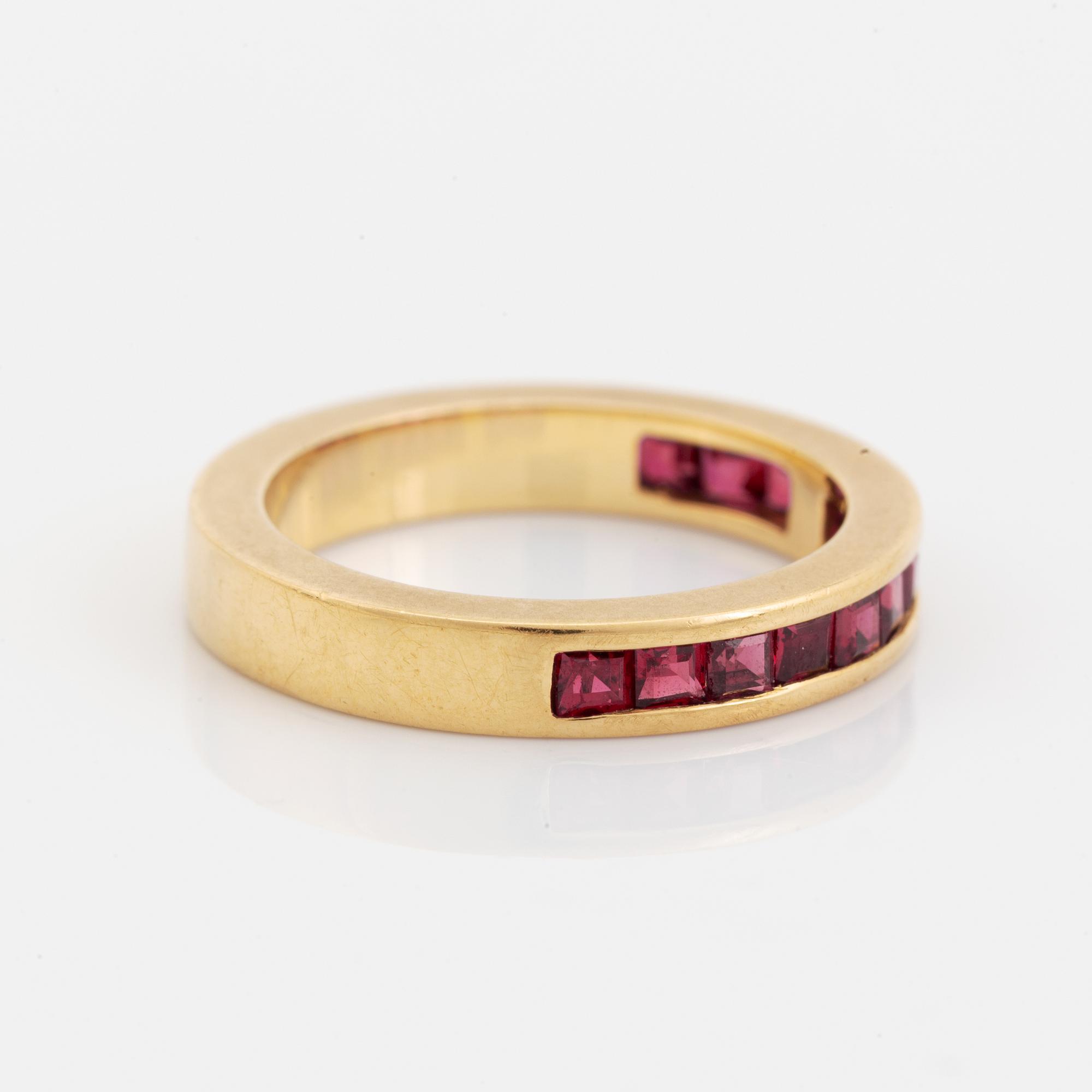 18K gold and step cut ruby ring.