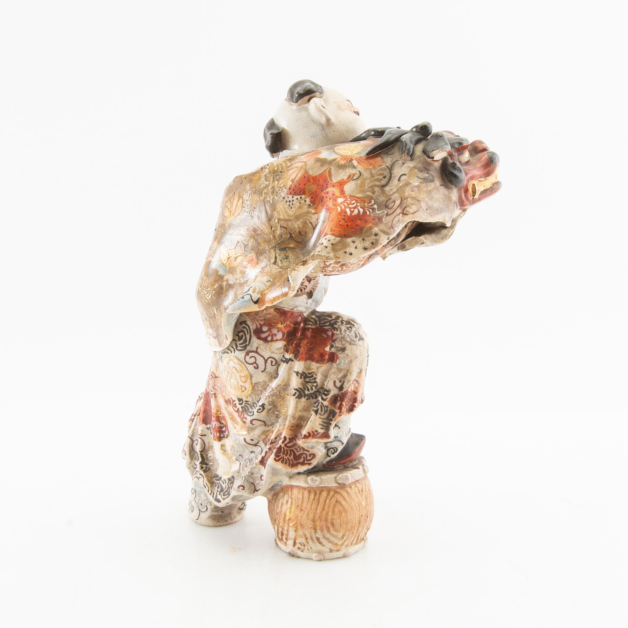 Figure Japan 20th century porcelain.