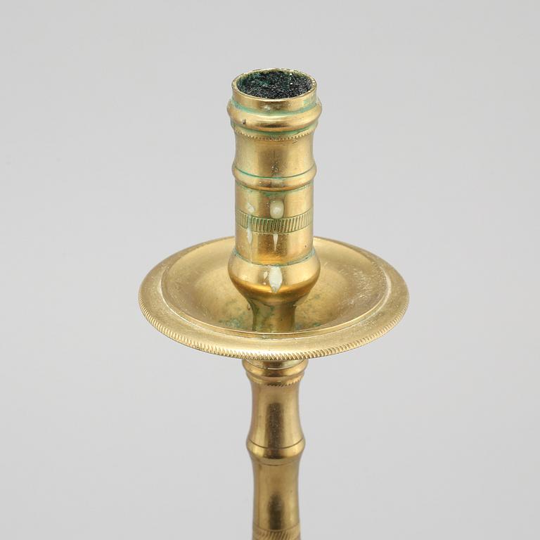 A pair of brass candlesticks, made around year 1900.