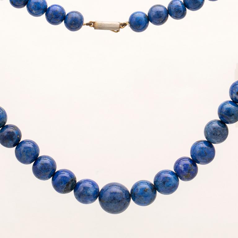 A set of lapis lazuli earrings and necklace.