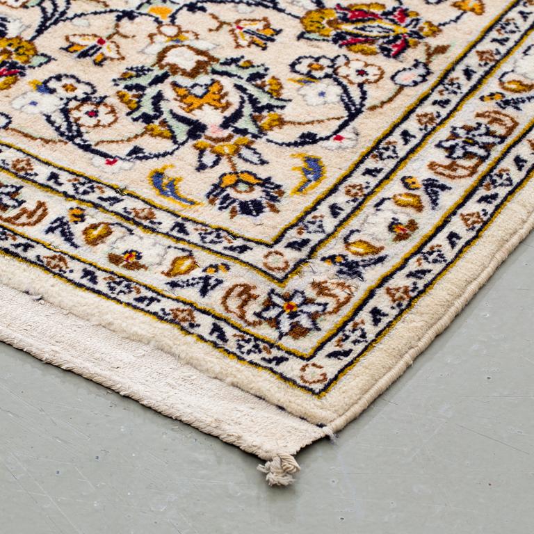 A carpet from Kashan, around 349 x 240 cm.