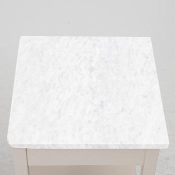 A pair of contemporary bedside tables.