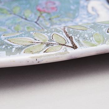 A ceramic plate signed Bryk Arabia.