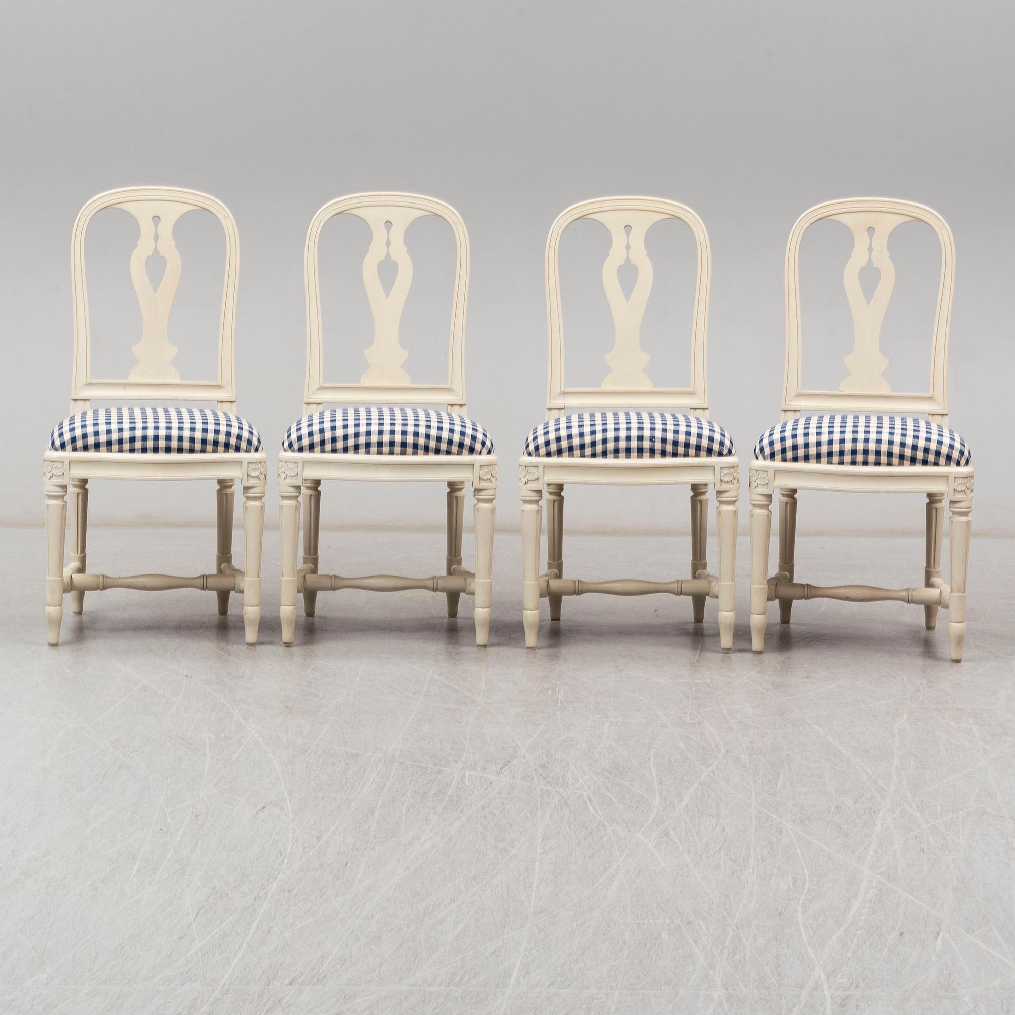Four Swedish Gustavian style 'Hallunda' dining chairs from IKEA's 18th century collection.