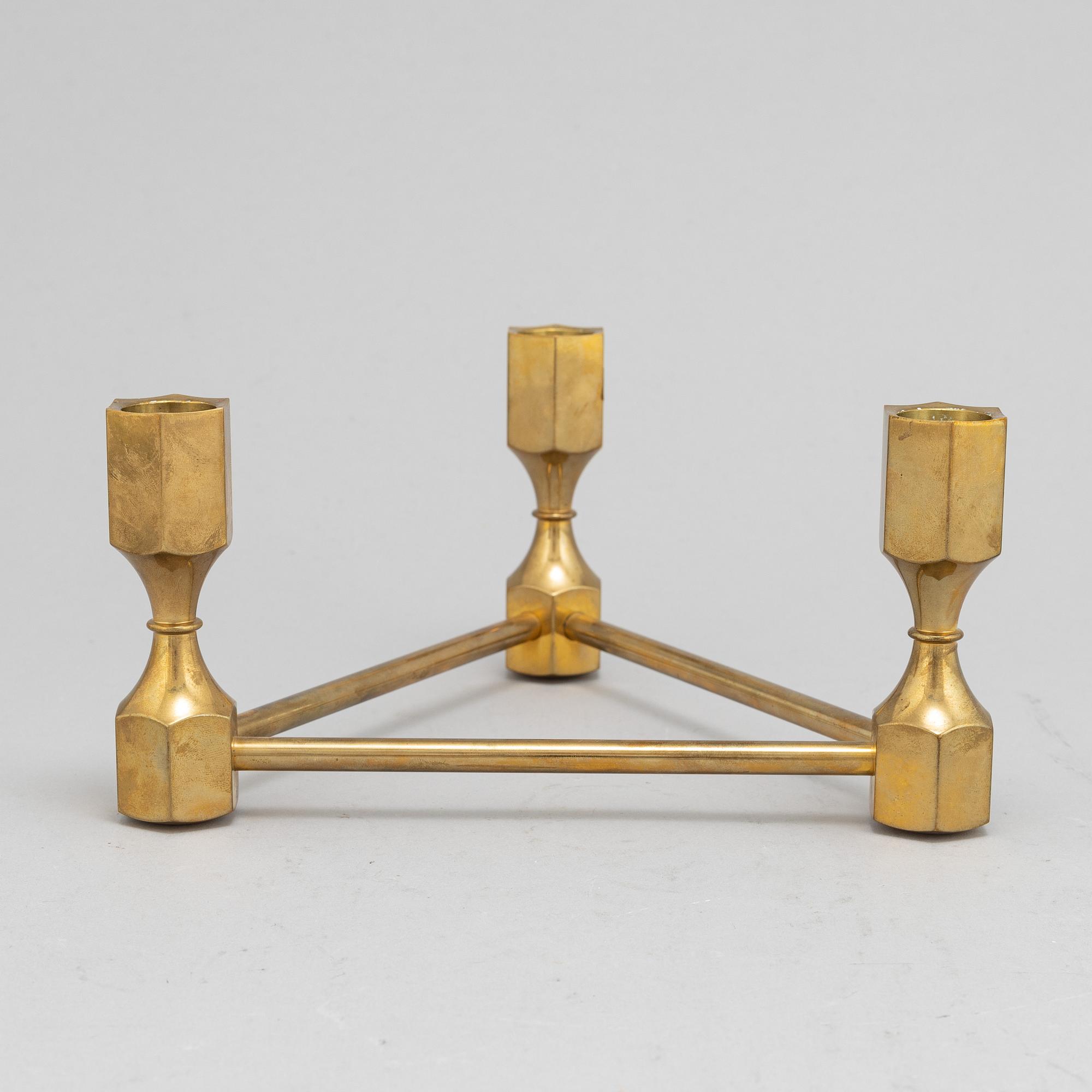Lars Bergsten, a set of five brass candlesticks from Gusum.