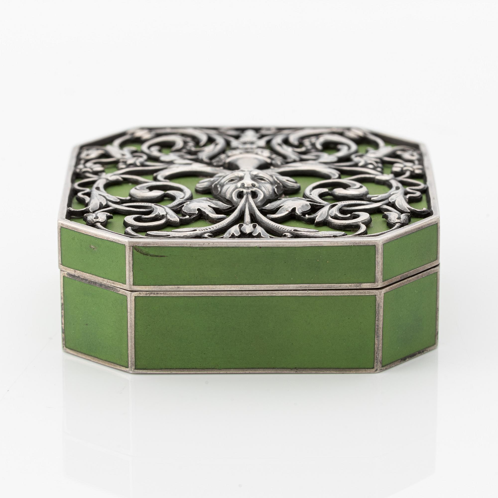 A rare silver and opaque green enamel pill box, Moscow 1912-1917.