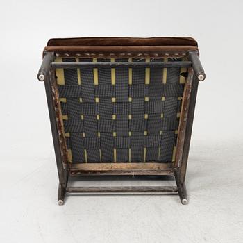 A pair of stained oak Gripsholm model armchair, late 20th Century.