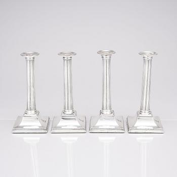 Four English 18th century silver candlesticks, mark of Young, Greaves & Hoyland, Sheffield 1780.