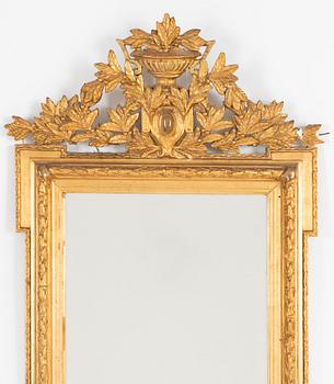 A Gustavian style mirror, around 1900.