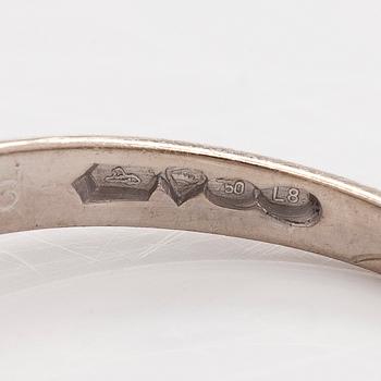 Ring, 18K vitguld med en briljantslipad diamant circa 0,62 ct, Kultakeskus 1988.