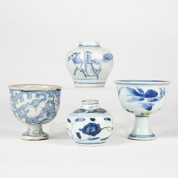 Two blue and white stemcups and two miniature jars, Ming dynasty (1368-1644).