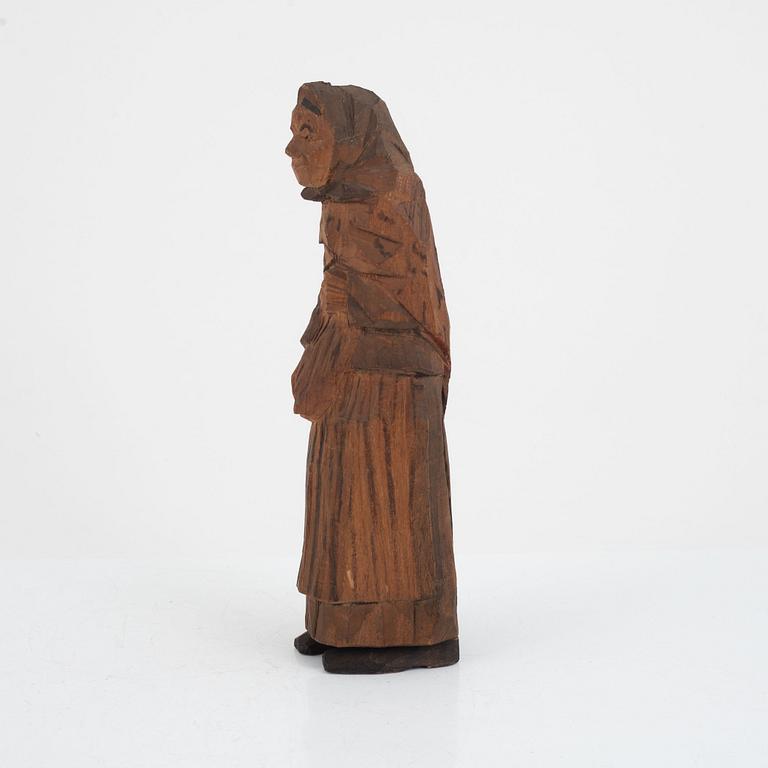Axel Petersson Döderhultarn, sculpture, stamp-signed. Partially painted wood, height 27 cm.