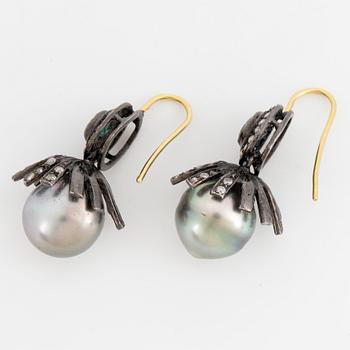 Cultured Tahitipearl, emerald and diamond earrings.