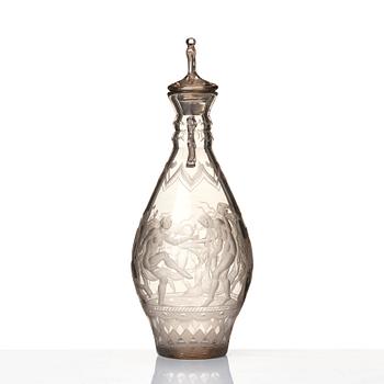 Simon Gate, an engraved glass decanter with stopper, Orrefors 1926, model 234.