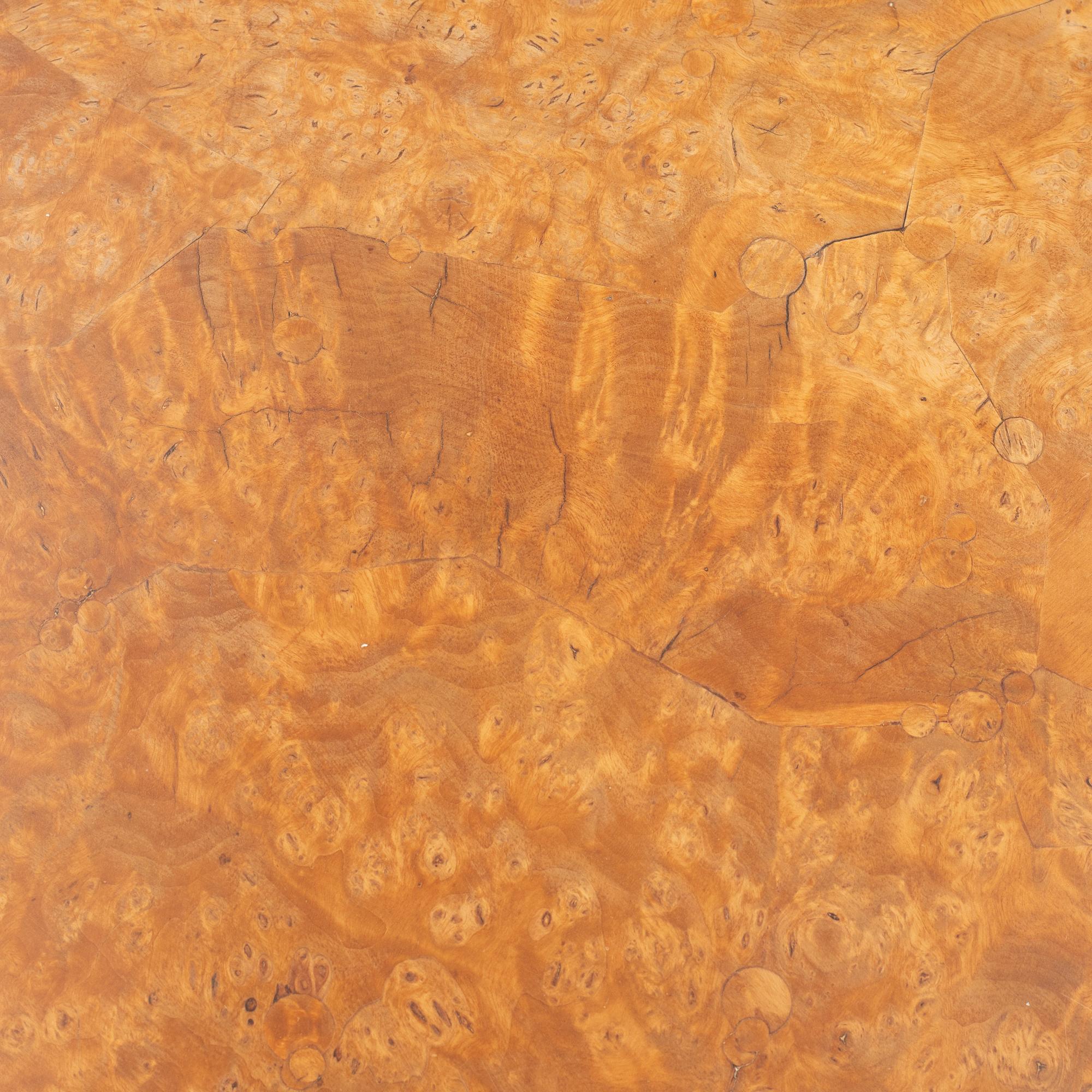 A 19th Century birch tilt top table.