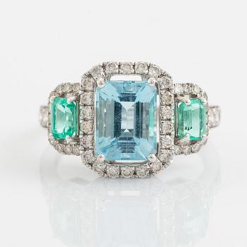 Aquamarine, emerald and brilliant-cut diamond ring.