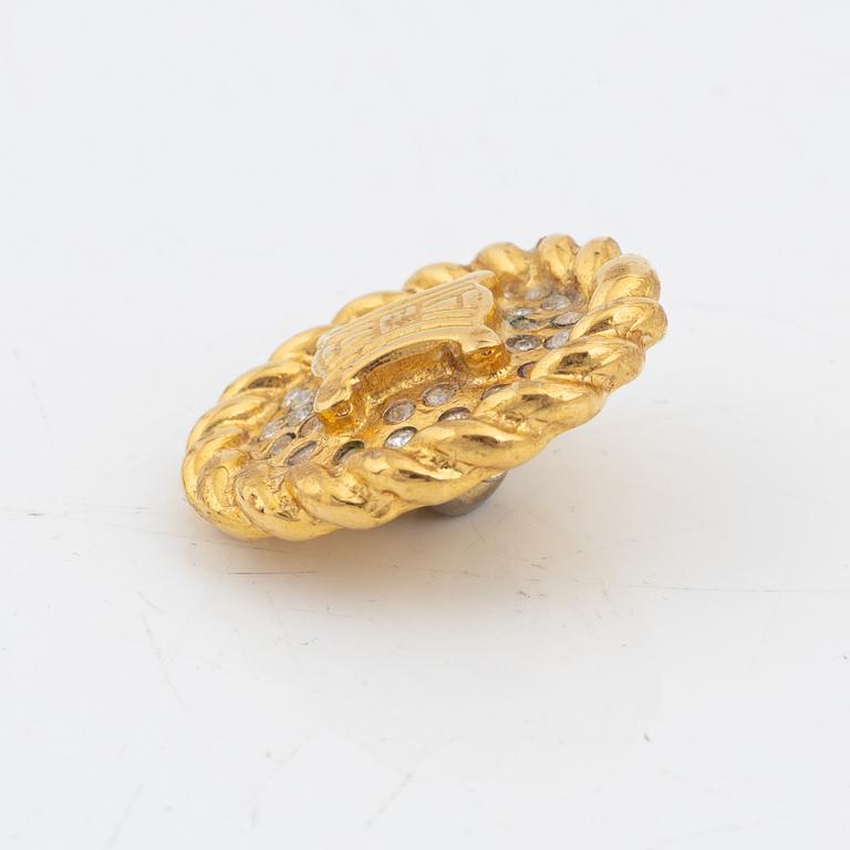 Céline, a set of four gold tone brooches.