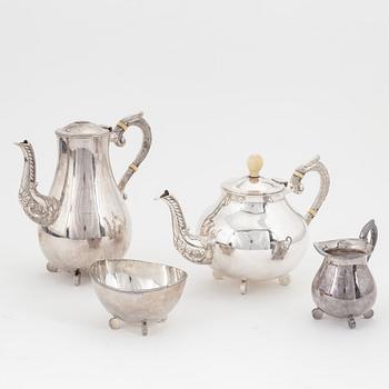 A sterling silver coffee pot, teapot, creamer and sugar bowl.